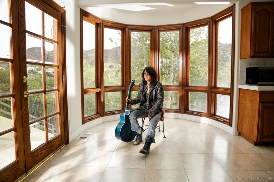 Aggressive make-up brunette posing naked on a chair - XXXonXXX - Pic 1