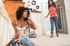Bedroom lesbian sex scene with two slender ebony babes