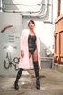 Red lipped asian in black lingerie and fishnet pantyhose walking on the