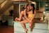 Brunette in yellow top and white shorts does hot shoot with another in