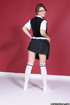 Bruette beauty in glasses and school uniform undressing and flashing her