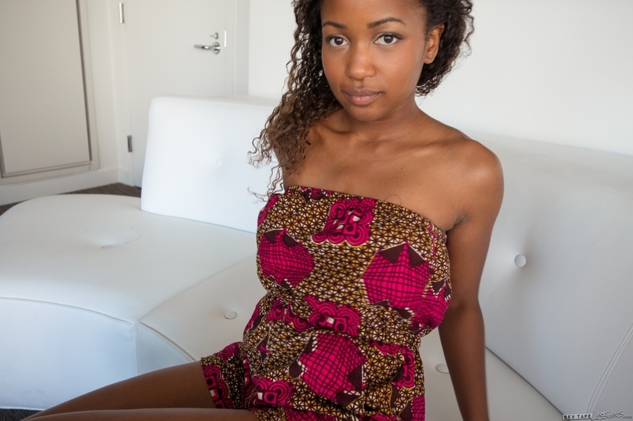 Steaming hot ebony in pink and brown dress and white underwear and an indulging hottie in turquoise blouse, blue bra and jeans skirt teases with their banging bodies before they get naked and expose their hot juggs and juicy pussies on a white bed. - XXXonXXX - Pic 2