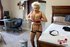 Guy throat-fucking a tied-up blonde BBW MILF