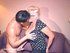 Dotted top blonde with glasses seducing an Asian dude