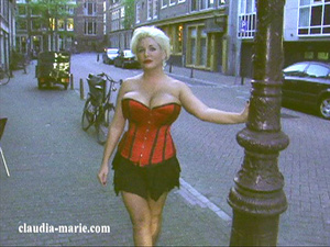Corset Blowjob - Red corset blonde dropping on all fours for a blowjob. Claudia Marie.  Picture 11.