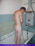 Horny granny with fat body wrapped in blue, pink and white towel watches