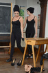 Future robbers putting on their skin-tight black outfits