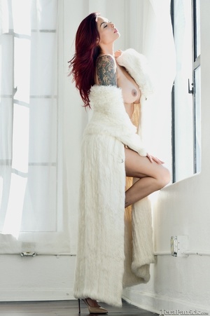 Redheaded babe in fur coat teases her na - Picture 11