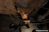 Kinky blonde in latex gets chained up and dominated by two guys.