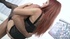 red-haired girl serves several
