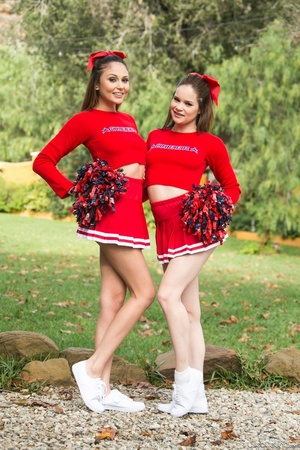Three sexy teens in red cheerleader uniform and no panty teasing outdoors and flashing their naked goods - Picture 5
