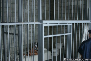 Stunning brunette in slutty prison outfi - Picture 7