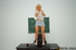Oiled-up blonde teacher with big tits gets fucked on a desk