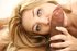 Perky blonde sucks and fucks a thick black dick in bed.