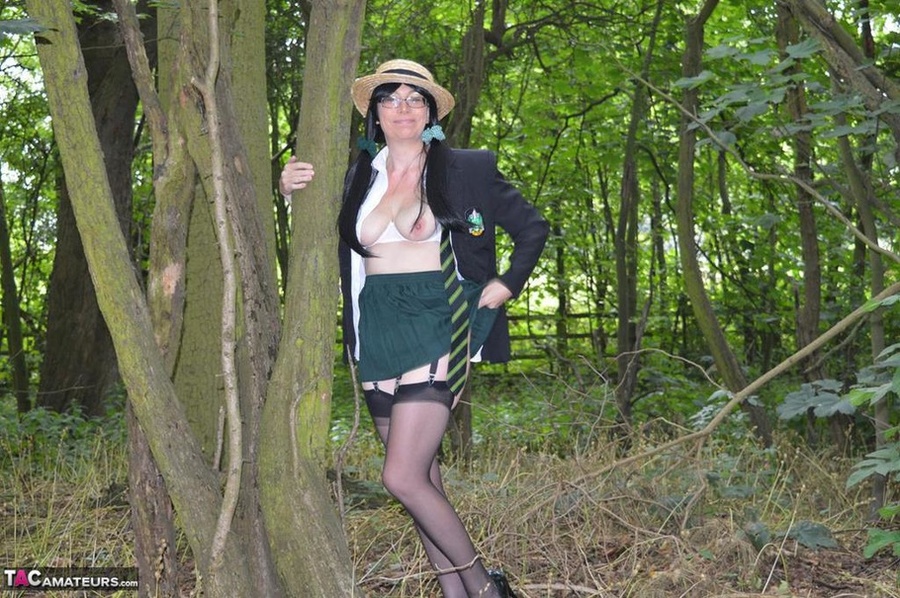 Slutty brunette milf poses seductively wearing sexy clothes in the woods - XXXonXXX - Pic 17