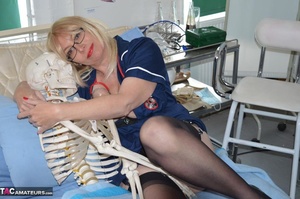 Lusty blonde cougar poses in lingerie and spreads her legs while in hospital bed - XXXonXXX - Pic 15