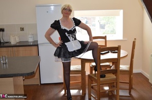 Naughty blonde maid poses in sexy lingerie and starts fiddling her clit - XXXonXXX - Pic 5