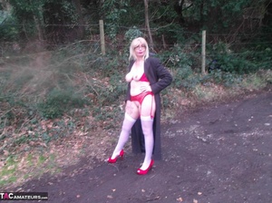 Blonde milf is teasing with her massive natural jugs in the outdoors - XXXonXXX - Pic 11