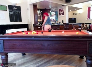 Redhead waitress exposes her large saggy tits and plays pool naked - Picture 15