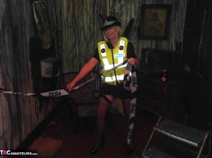 Long legged police woman poses in sexy black nylons and exposes her tits - XXXonXXX - Pic 11