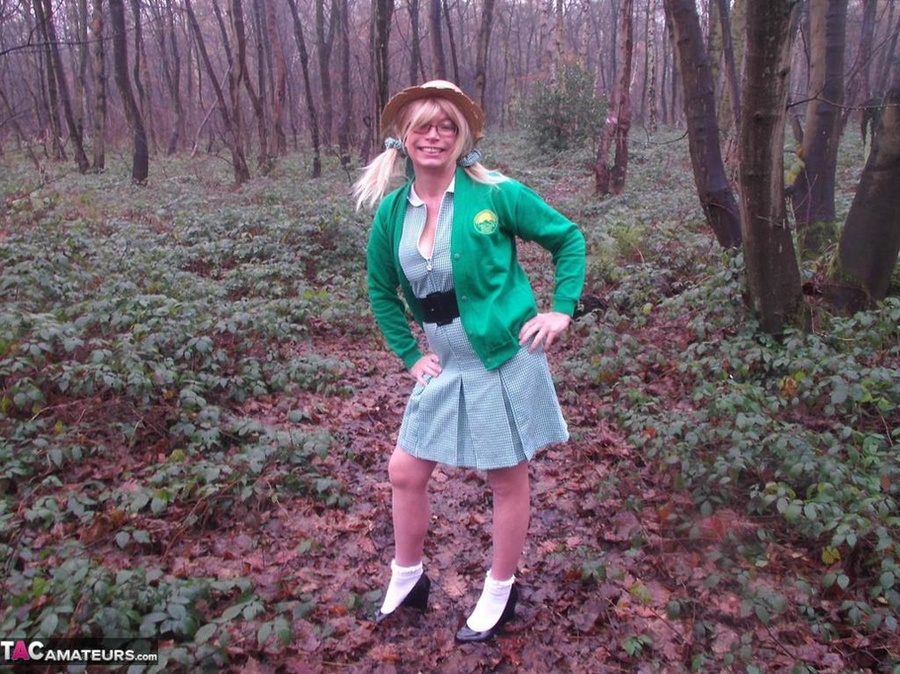 Milf with big tits is posing in several locations, wearing sexy clothes - XXXonXXX - Pic 16