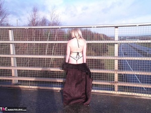 Hot blonde slut shows her bare ass and big tits on an empty highway - XXXonXXX - Pic 9