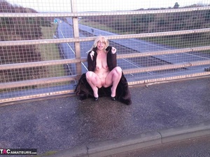 Hot blonde slut shows her bare ass and big tits on an empty highway - XXXonXXX - Pic 16