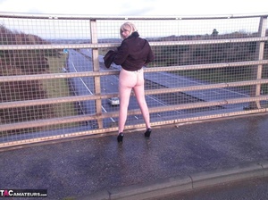 Hot blonde slut shows her bare ass and big tits on an empty highway - XXXonXXX - Pic 18
