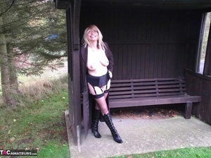 Blonde is wearing leather boots while exposing her massive tits and pussy to the cam - XXXonXXX - Pic 14
