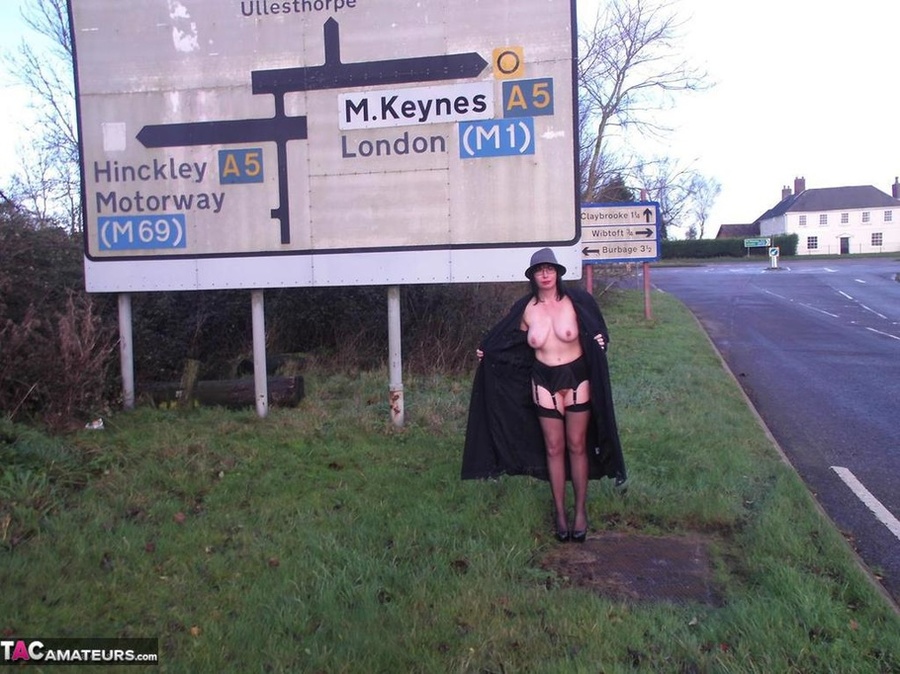 Blonde is wearing leather boots while exposing her massive tits and pussy to the cam - XXXonXXX - Pic 20