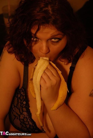 Busty slut is having fun while sucking a banana like it was a real cock - Picture 20