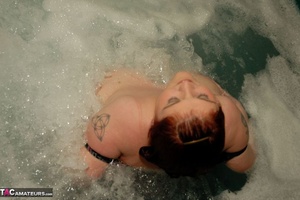 Fat chick is having a bath while the camera is focused on her massive breasts - XXXonXXX - Pic 11