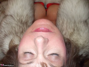 Lusty mature slut is wearing a fur coat while sucking a dick - Picture 20