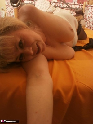 Mature blonde plays with her massive tits and poses in sexy lingerie - XXXonXXX - Pic 12