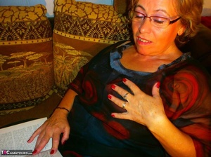 Mature blonde bitch is wearing glasses while fondling her massive boobs - XXXonXXX - Pic 8