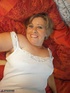 blonde mature bimbo poses