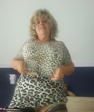 Beautiful blonde milf is posing in sexy dress and nylon stockings - XXXonXXX - Pic 10