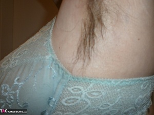 Hot mature slut shows her hairy armpit and teases with nice ass - Picture 13