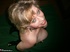 smiling blonde milf teases