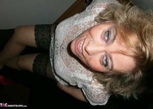Blonde milf shows her sexy ass to the camera, while wearing hot nylons - XXXonXXX - Pic 8
