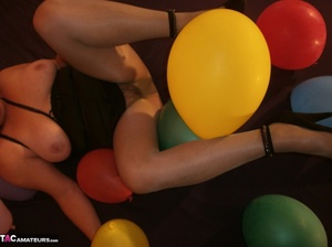 Blonde cougar plays with balloons and shows her massive tits to the cam - XXXonXXX - Pic 4