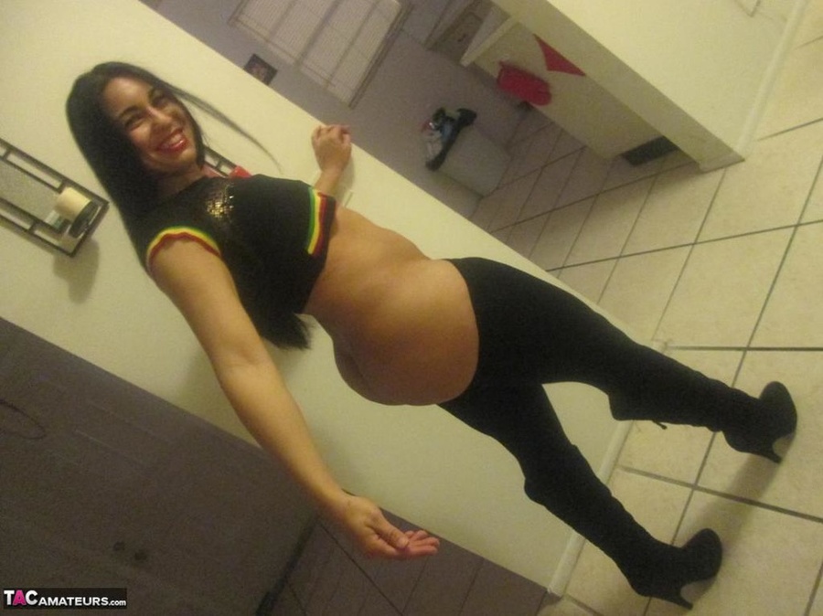 Alluring Latin vixen shows her amazing ass to the camera and plays with massive breasts - XXXonXXX - Pic 10