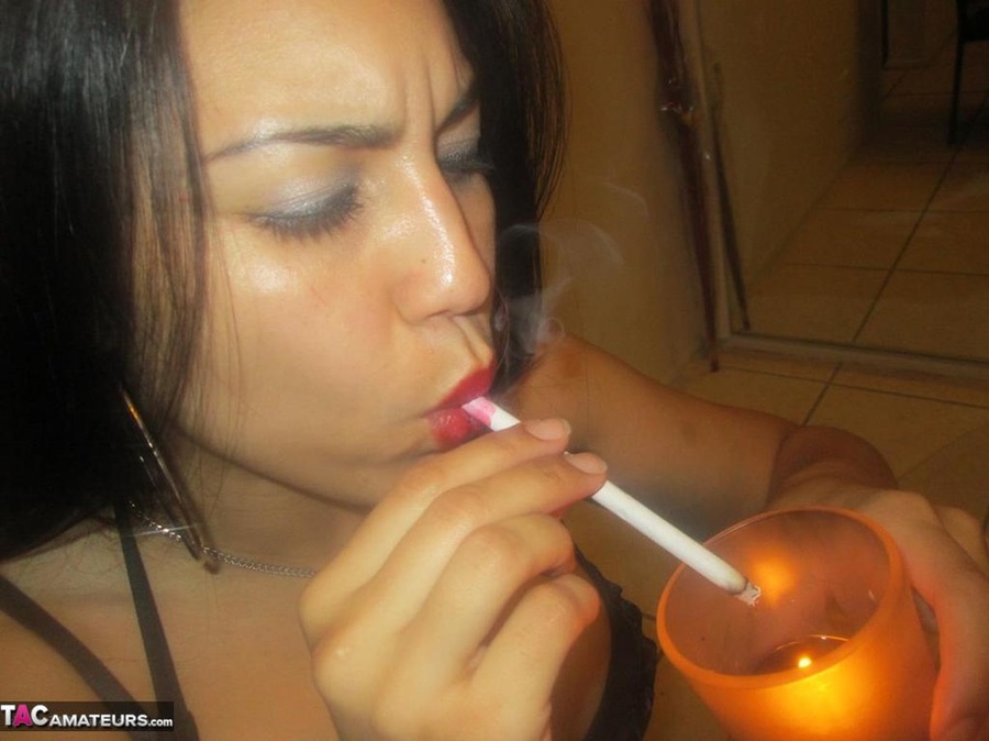 Hot Latina with big jugs strips her clothes while smoking a cigarette - XXXonXXX - Pic 5