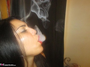 Hot Latina with big jugs strips her clothes while smoking a cigarette - XXXonXXX - Pic 11