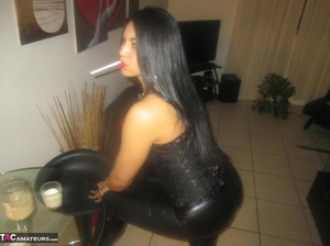 Sexy Latin bimbo poses in tight latex leggings and shows her bare tits - Picture 8