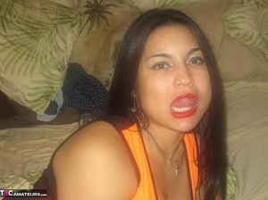 Alluring Latina spreads her legs to the camera, while wearing hot fishnet stockings - Picture 7
