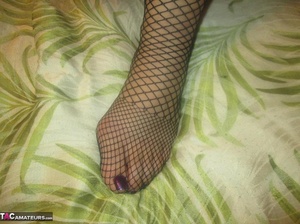 Alluring Latina spreads her legs to the camera, while wearing hot fishnet stockings - XXXonXXX - Pic 16