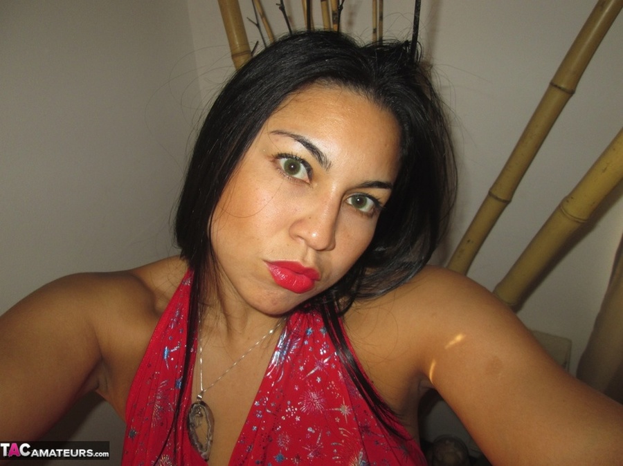 Beautiful Latina is playing with her large natural tits while posing seductively - XXXonXXX - Pic 7