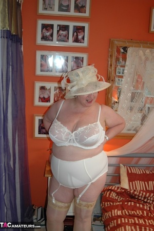 Fat bimbo is posing in sexy lingerie which makes her large tits look nice - Picture 13