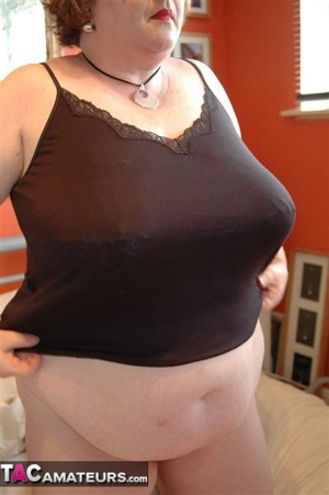Big breasted fatty shows her massive natural bazookas to the camera - Picture 4